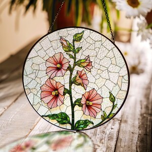 Pink hollyhocks blooming in sunlight round stained glass suncatcher garden window gift for mom